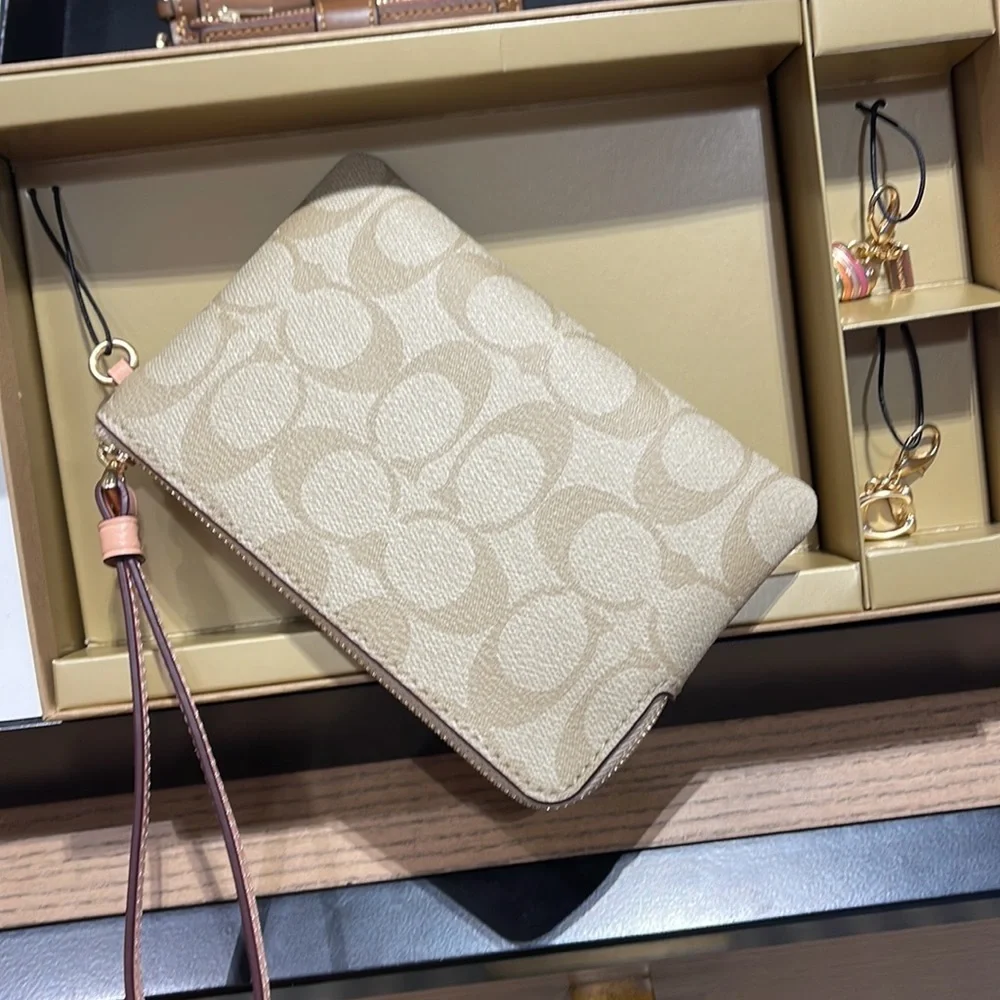 Coach Boxed Corner Zip Wristlet In Signature Canvas Gold/Light Khaki/Faded Blush